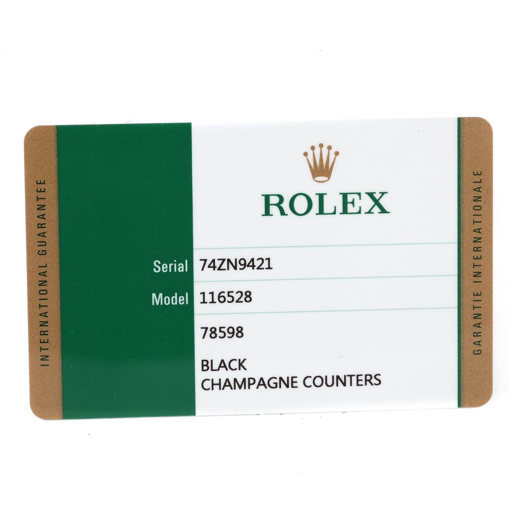The image shows a Rolex warranty card for the Daytona model, displaying the serial number, model number, and color details.
