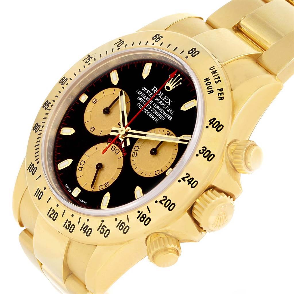 This Rolex Daytona 116528 Men's Yellow Gold Black Dial 116528 Men's Yellow Gold Black Dial watch is shown at an angled view, highlighting the face, bezel, and crown.