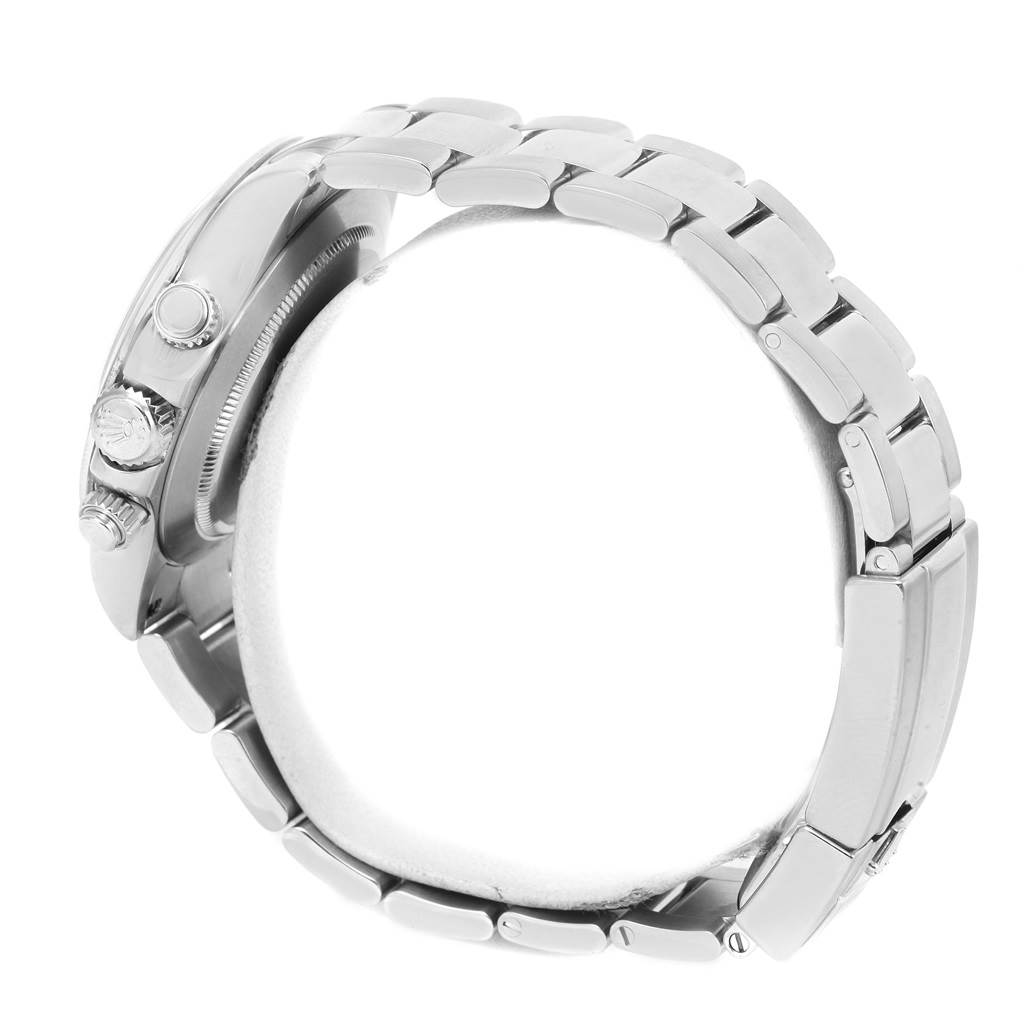 This image shows a side view of the Rolex Daytona 116520 Men's Stainless Steel White Dial 116520 Men's Stainless Steel White Dial watch, highlighting the crown and pushers.