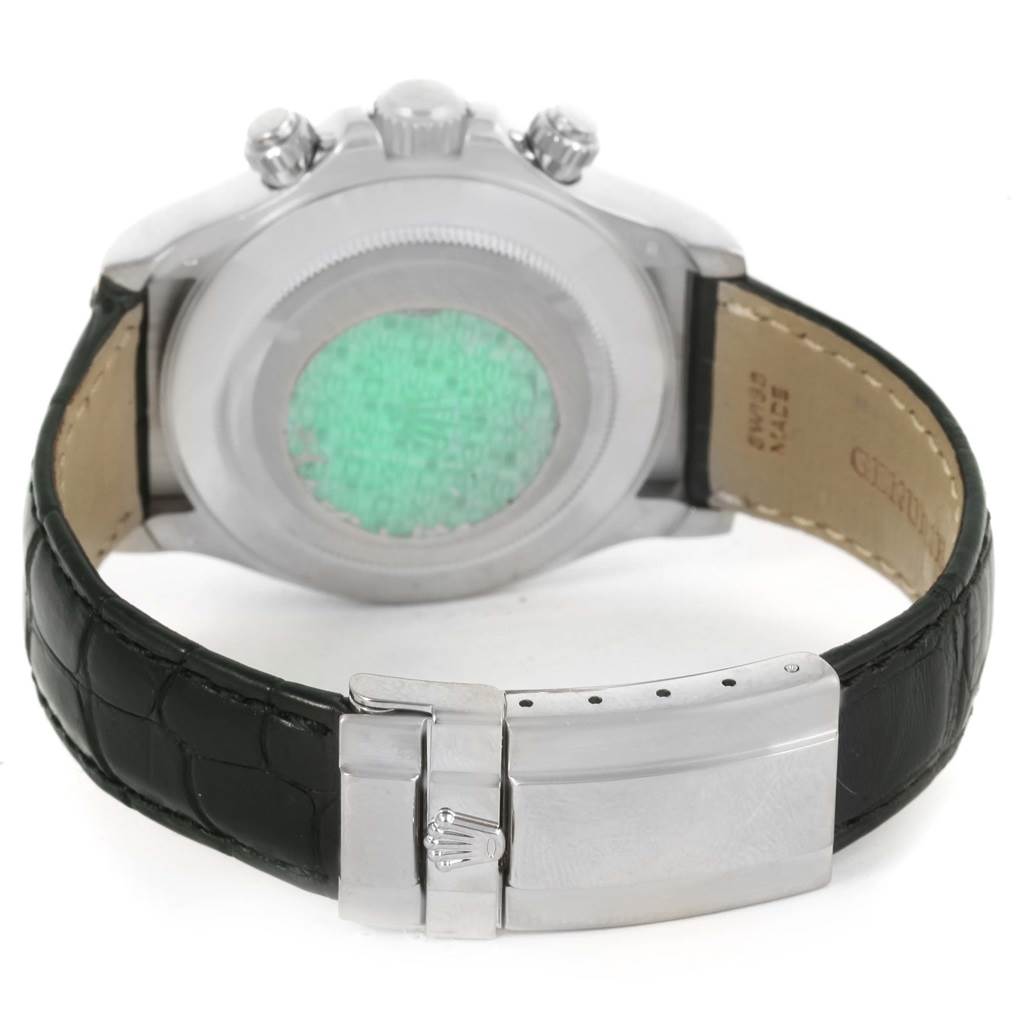 The image shows the back of a Rolex Daytona 116519 Men's White Gold White Dial 116519 Men's White Gold White Dial watch with its clasp and black leather strap.