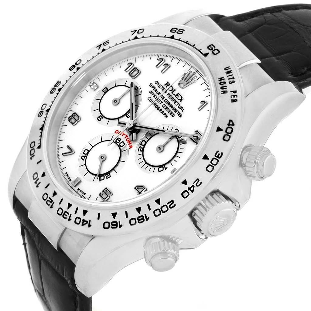 The image shows a Rolex Daytona 116519 Men's White Gold White Dial 116519 Men's White Gold White Dial watch at an angled top view, displaying the face, bezel, pushers, and part of the strap.