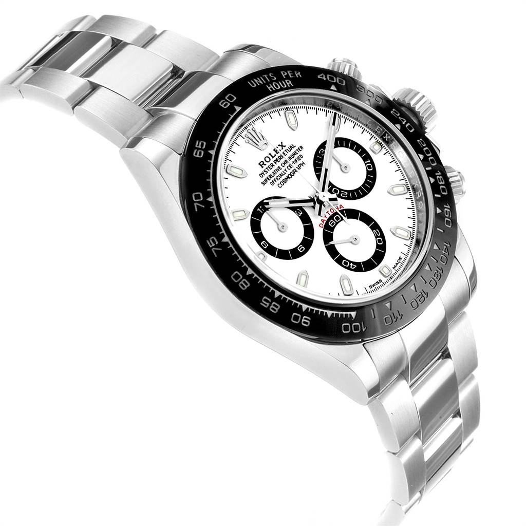 The image shows a Rolex Daytona 116500 Men's Stainless Steel White Dial 116500 Men's Stainless Steel White Dial watch at a slight angle with focus on its face, bezel, and stainless steel bracelet.