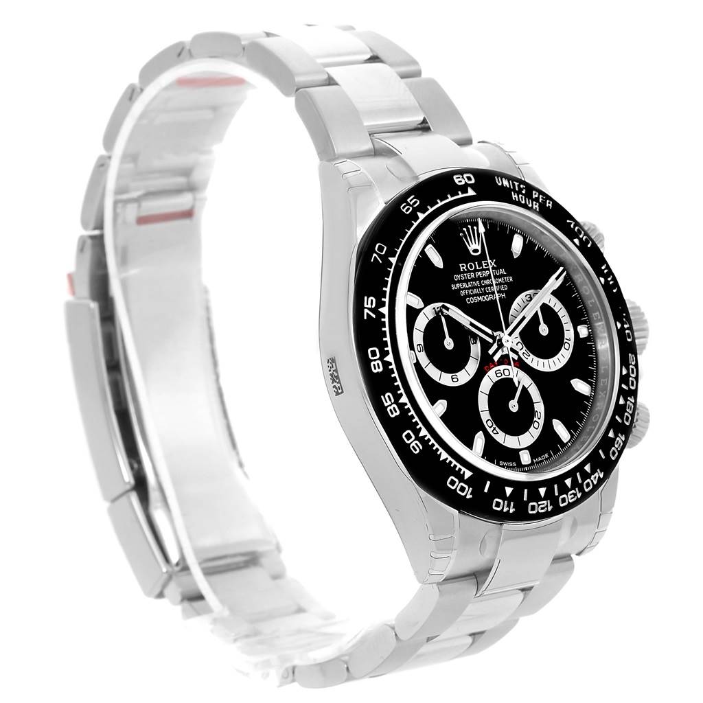 The image shows a Rolex Daytona 116500 Men's Stainless Steel Black Dial 116500 Men's Stainless Steel Black Dial watch angled from the left side, displaying the bezel, dial, chronograph subdials, and part of the bracelet.