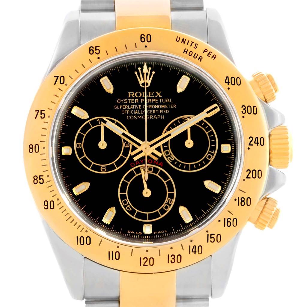 This image shows a front view of the Rolex Daytona 116523 Men's Steel and Gold (two tone) Black Dial 116523 Men's Steel and Gold (two tone) Black Dial watch featuring its gold bezel, black dial, and subdials.