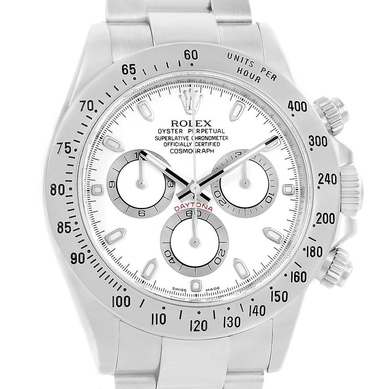 The image shows a frontal view of a Rolex Daytona watch, featuring its white dial, three sub-dials, and a stainless steel bracelet.