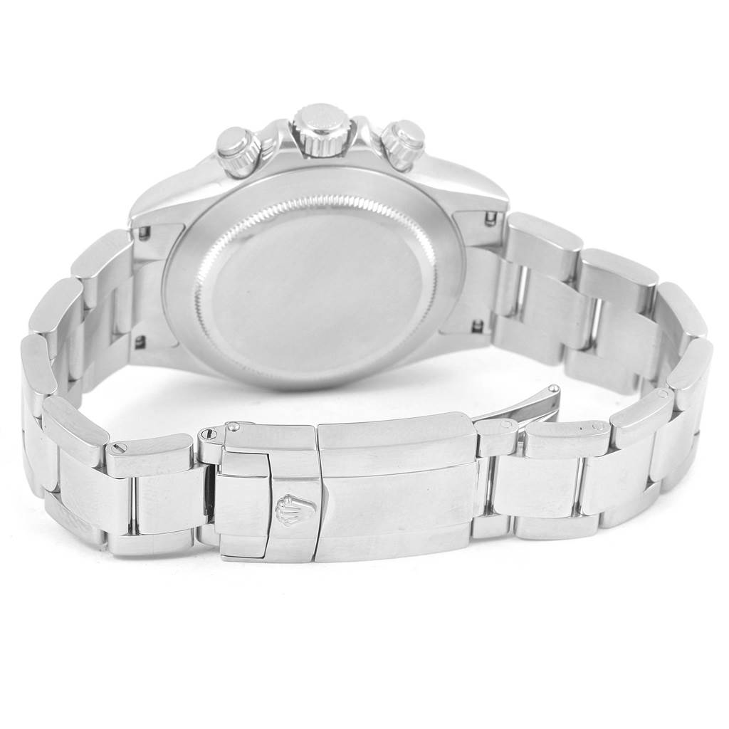 The image shows the back view of a Rolex Daytona 116520 Men's Stainless Steel White Dial 116520 Men's Stainless Steel White Dial watch, focusing on the clasp, bracelet, and case back.