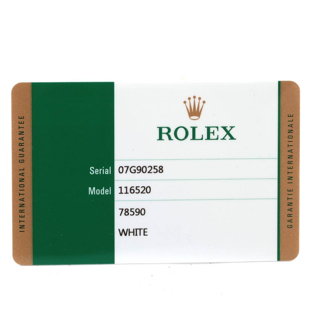 This image shows the international guarantee card for a Rolex Daytona 116520 Men's Stainless Steel White Dial 116520 Men's Stainless Steel White Dial model watch, displaying details like serial number and model number.
