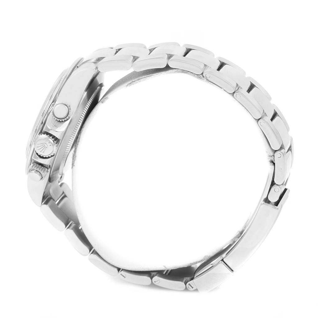 The image shows a side view of a Rolex Daytona 116520 Men's Stainless Steel White Dial 116520 Men's Stainless Steel White Dial watch, highlighting the bracelet and side profile of the case and pushers.