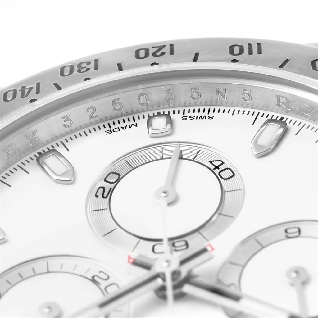 This image shows a close-up of the dial and bezel of a Rolex Daytona 116520 Men's Stainless Steel White Dial 116520 Men's Stainless Steel White Dial watch.
