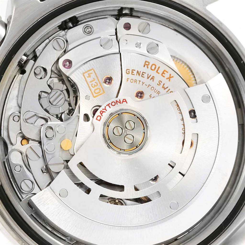 This image shows a close-up of the movement components and rotor of a Rolex Daytona 116520 Men's Stainless Steel Black Dial 116520 Men's Stainless Steel Black Dial watch.
