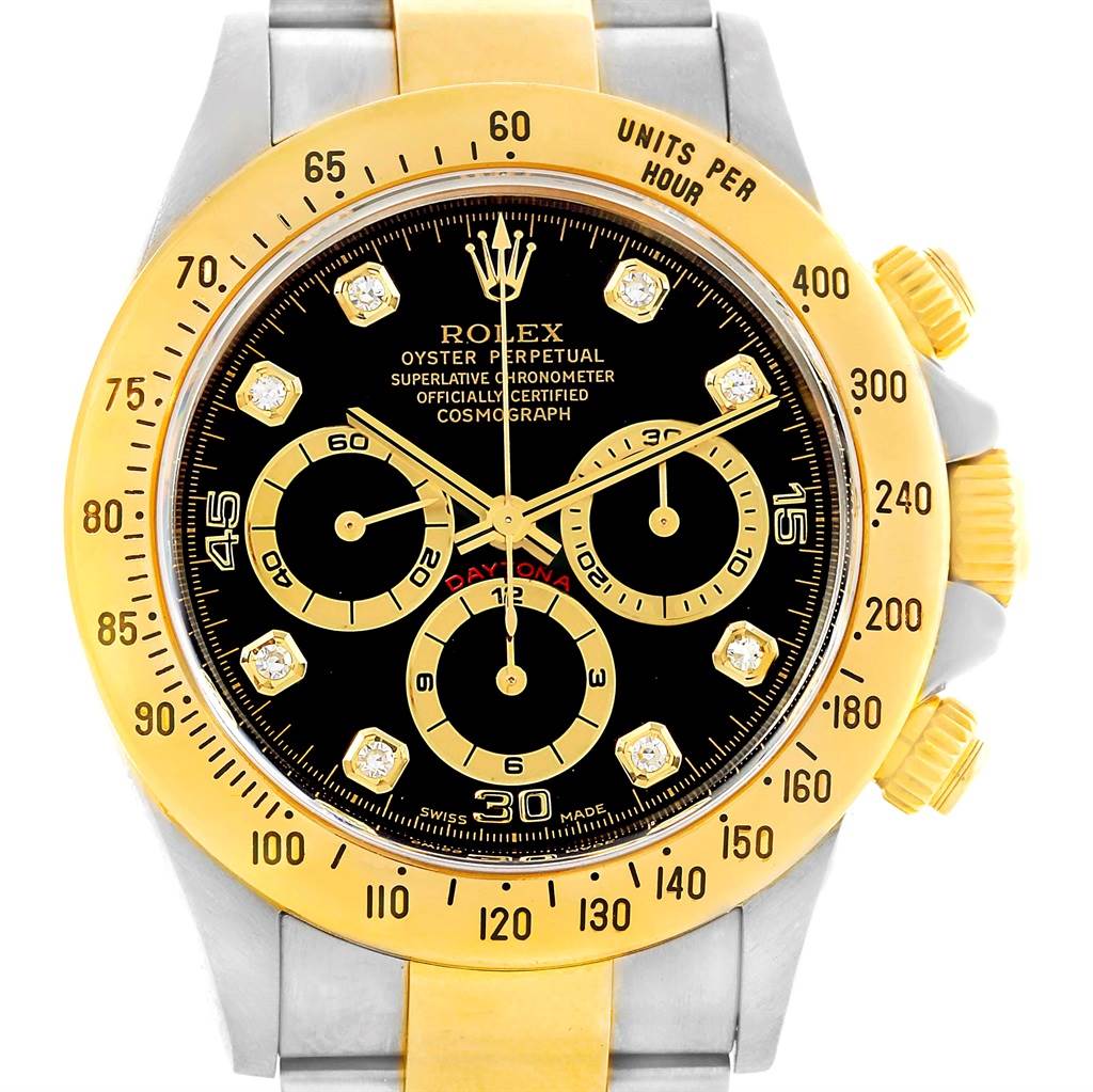 The image shows a front view of the Rolex Daytona 16523 Men's Steel and Gold (two tone) Black Dial 16523 Men's Steel and Gold (two tone) Black Dial watch featuring its dial, bezel, chronograph subdials, and case.