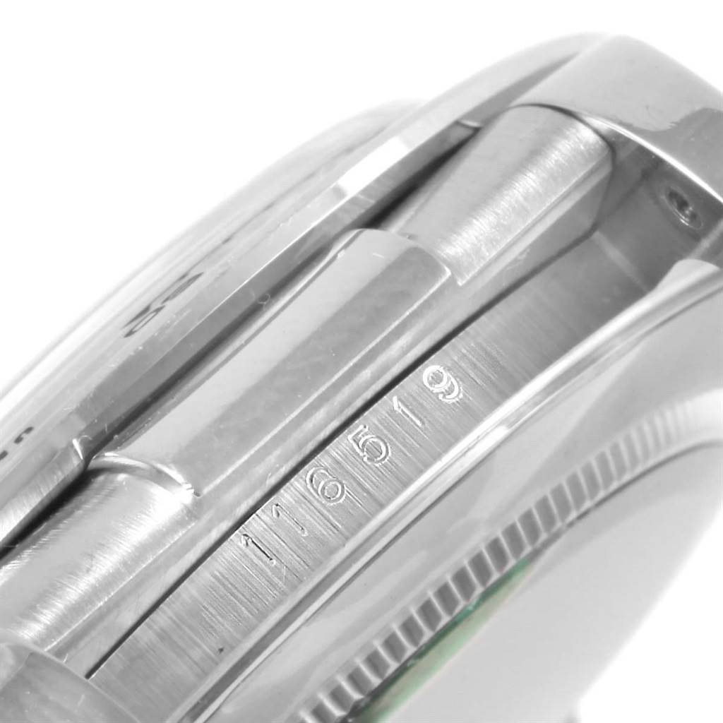 The image shows a close-up side view of the case and bezel, displaying the model number of the Rolex Daytona 116519 Men's White Gold Silver Dial 116519 Men's White Gold Silver Dial watch.