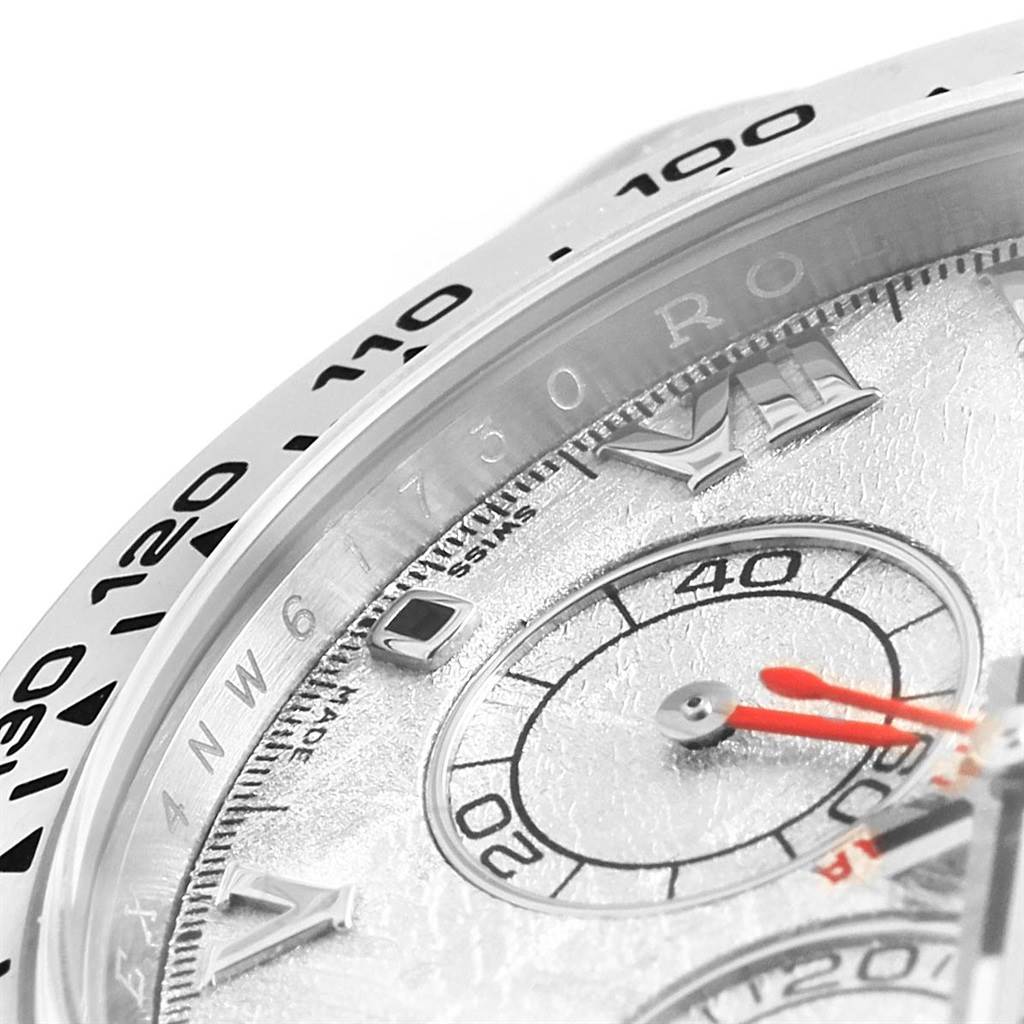 This image shows a close-up of the dial and part of the bezel of the Rolex Daytona 116519 Men's White Gold Silver Dial 116519 Men's White Gold Silver Dial watch.