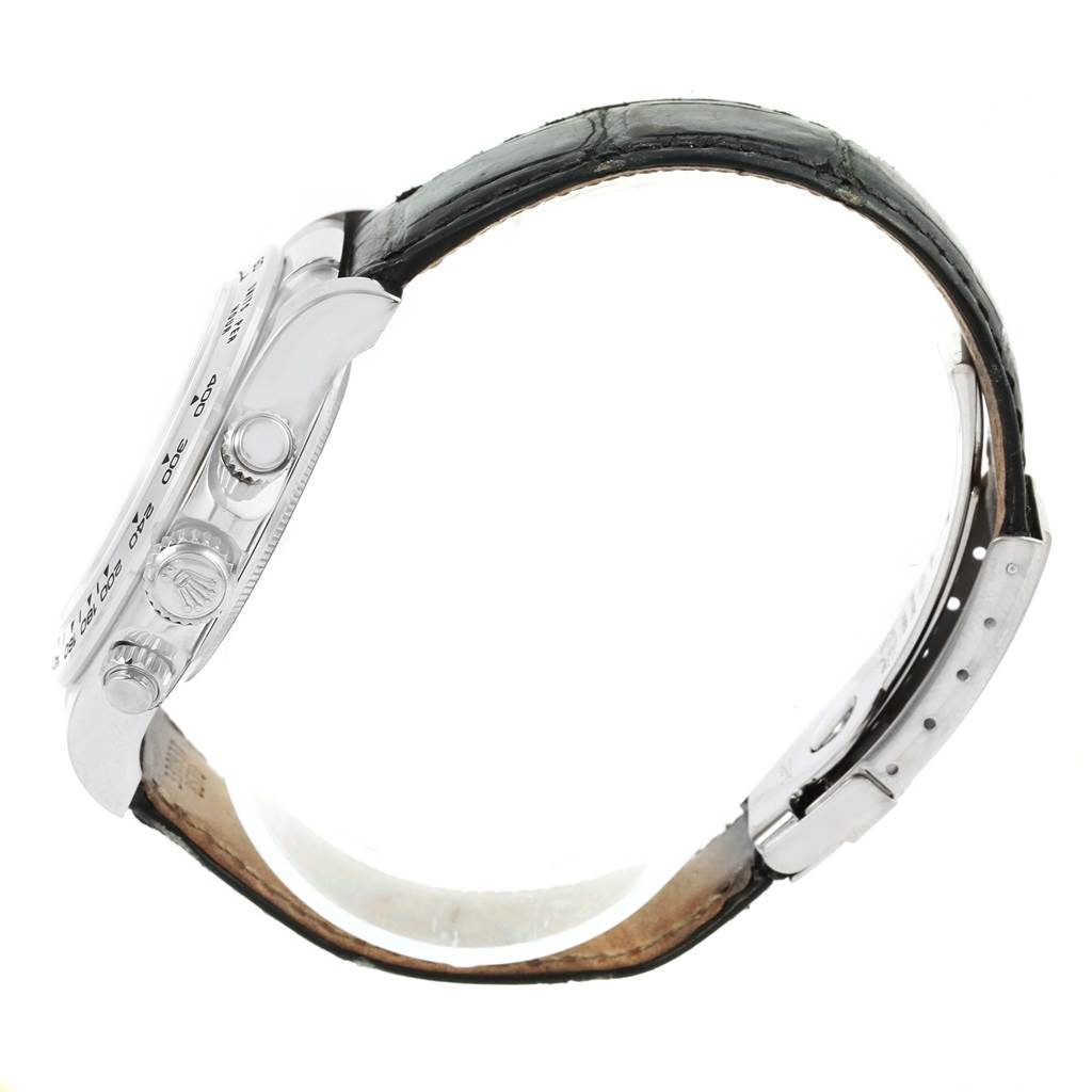 The image shows a side view of a Rolex Daytona 116519 Men's White Gold Silver Dial 116519 Men's White Gold Silver Dial watch, displaying its crown, pushers, and leather strap.