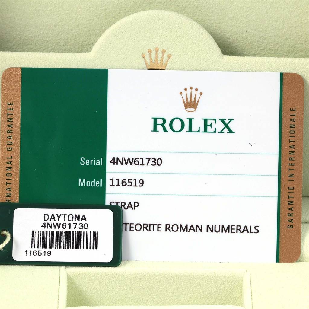 The image shows the warranty card and tag of a Rolex Daytona 116519 Men's White Gold Silver Dial 116519 Men's White Gold Silver Dial watch, model 116519, featuring a meteorite dial with Roman numerals.