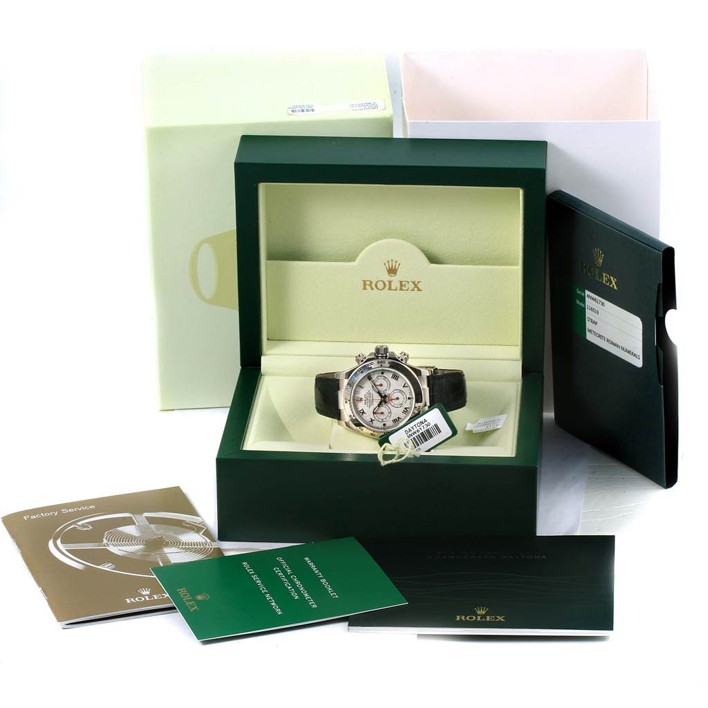 The image shows a Rolex Daytona 116519 Men's White Gold Silver Dial 116519 Men's White Gold Silver Dial watch in its box, accompanied by manuals and warranty cards, viewed from the front.