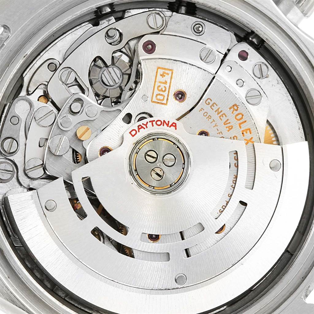 This image shows the detailed internal mechanism and rotor of a Rolex Daytona 116520 Men
s Stainless Steel White Dial 116520 Men
s Stainless Steel White Dial watch from a close-up, back angle.