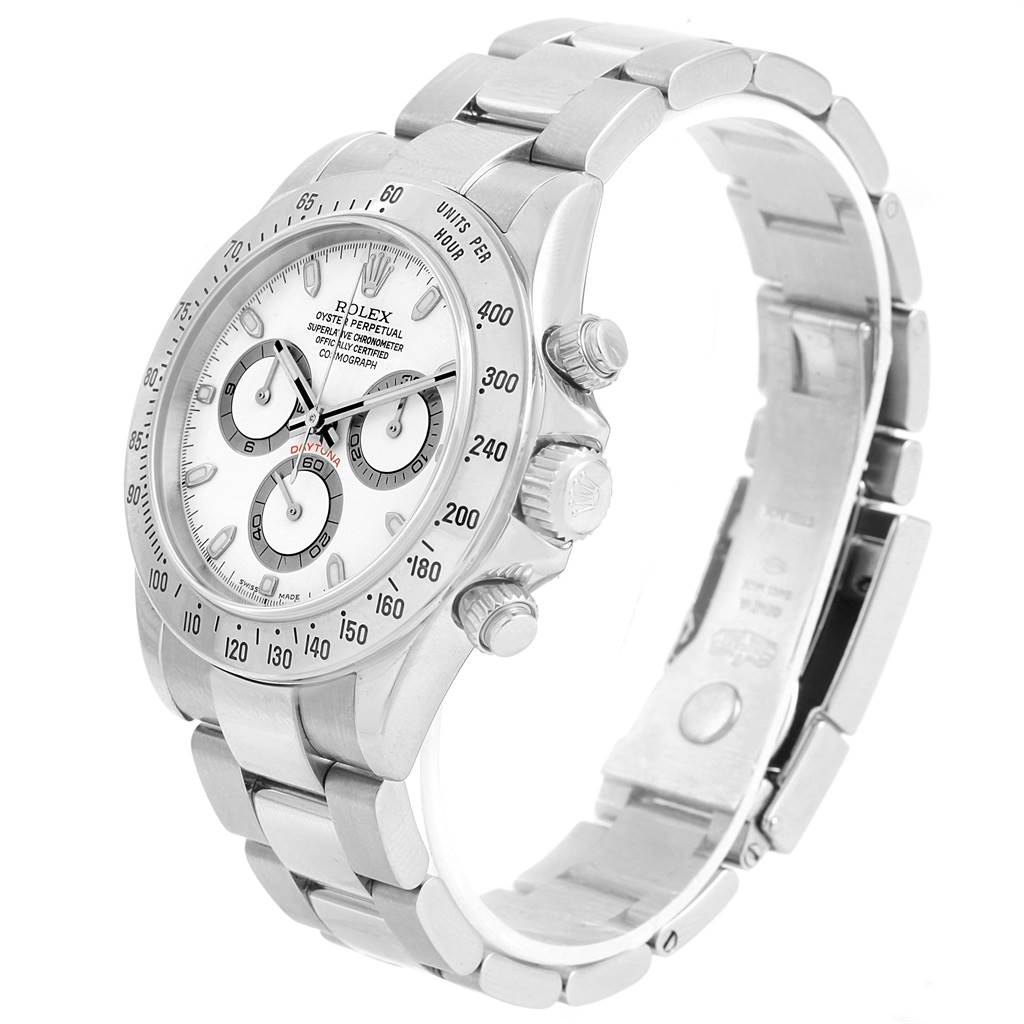 The Rolex Daytona 116520 Men
s Stainless Steel White Dial 116520 Men
s Stainless Steel White Dial watch is shown at an angle that highlights the face, bezel, pushers, and bracelet.