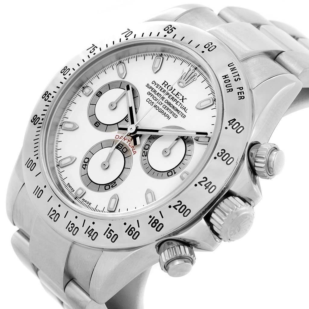 The image shows a side and slightly angled view of the Rolex Daytona 116520 Men
s Stainless Steel White Dial 116520 Men
s Stainless Steel White Dial watch, highlighting its bezel, dials, and crown.