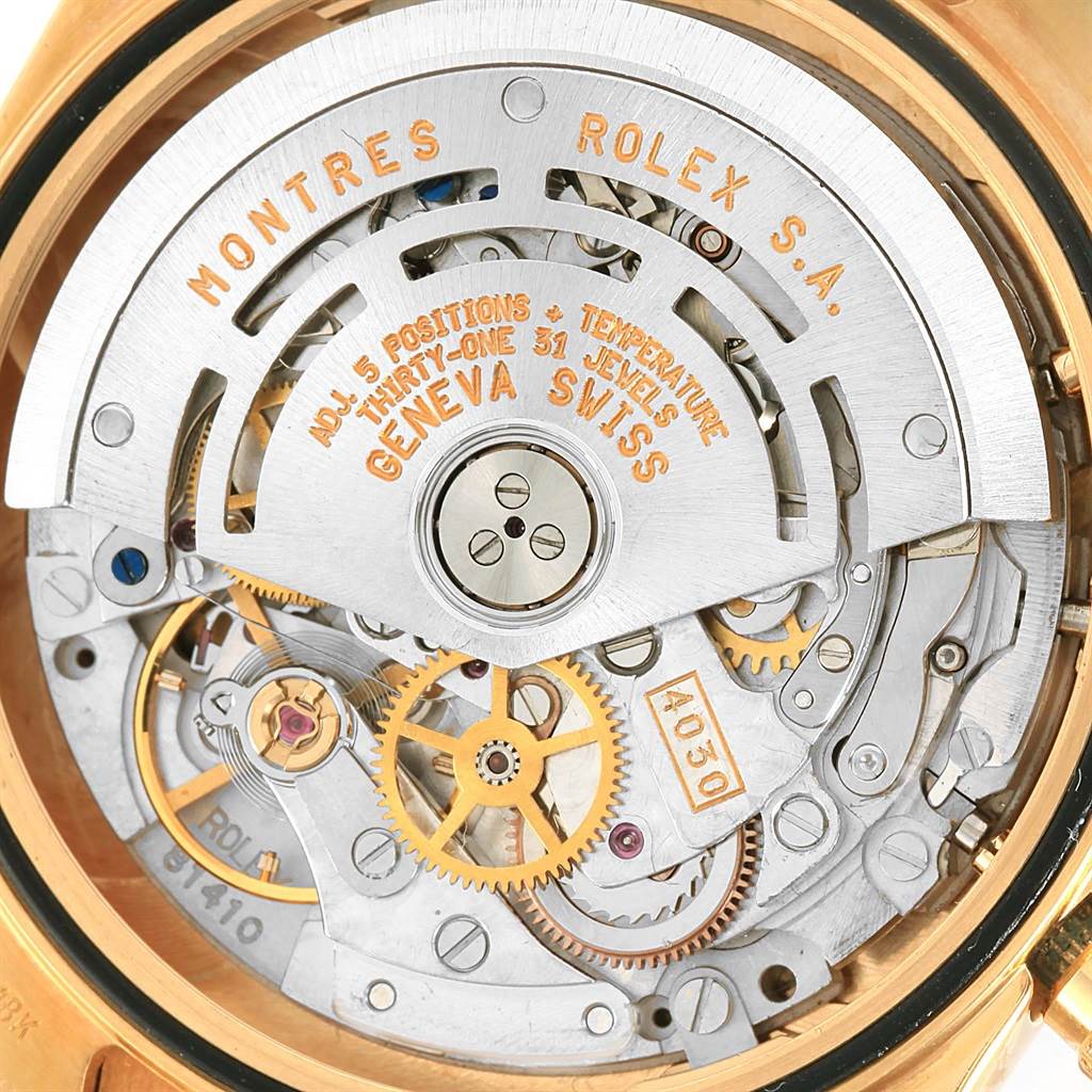 This is a close-up view of the movement of a Rolex Daytona 16518 Men's Yellow Gold White Dial 16518 Men's Yellow Gold White Dial watch, showcasing its intricate internal mechanics.