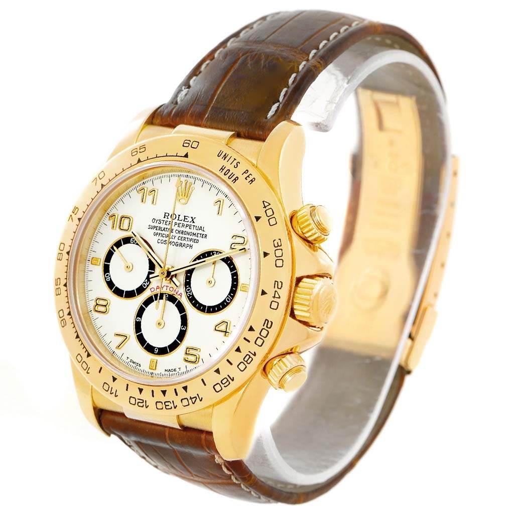 The image shows a Rolex Daytona 16518 Men's Yellow Gold White Dial 16518 Men's Yellow Gold White Dial watch from a front angled view, highlighting the dial, bezel, crown, and strap.