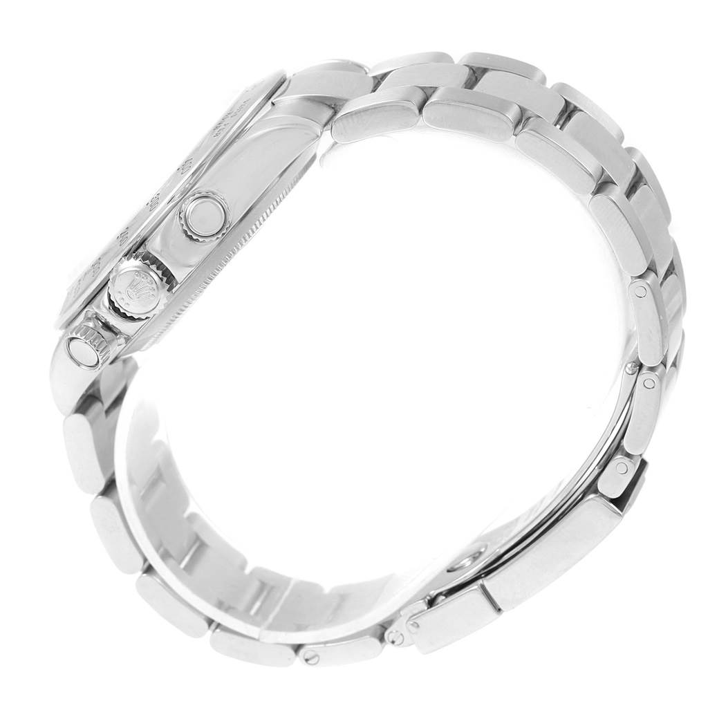 This image shows a side view of a Rolex Daytona 116520 Men's Stainless Steel White Dial 116520 Men's Stainless Steel White Dial watch, highlighting the bracelet and crown.