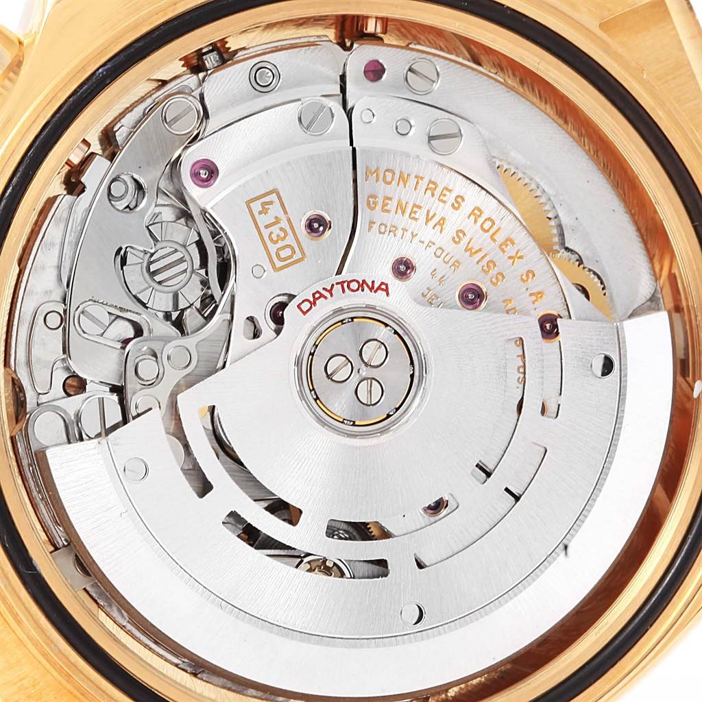 This image shows a close-up view of the movement mechanism of a Rolex Daytona 116518 Men's Yellow Gold White Dial 116518 Men's Yellow Gold White Dial watch.