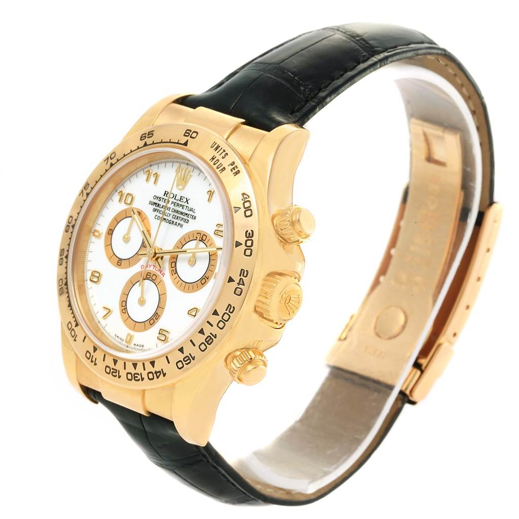 The image shows a side-angle view of a Rolex Daytona 116518 Men's Yellow Gold White Dial 116518 Men's Yellow Gold White Dial watch, highlighting the dial, bezel, crown, pushers, and leather strap.