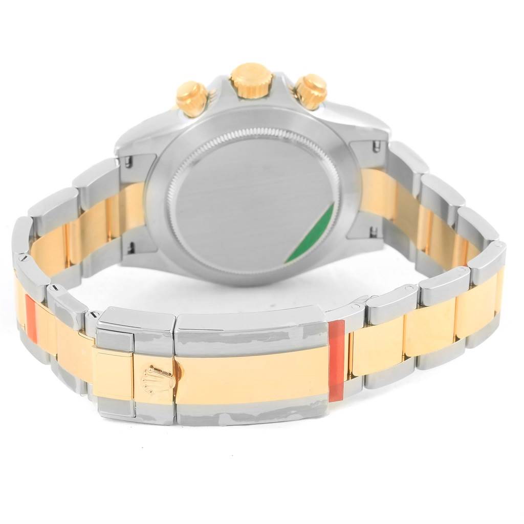 The image shows the back case and bracelet of a Rolex Daytona 116503 Men's Steel and Gold (two tone) White Dial 116503 Men's Steel and Gold (two tone) White Dial watch, highlighting the two-tone metal finish.