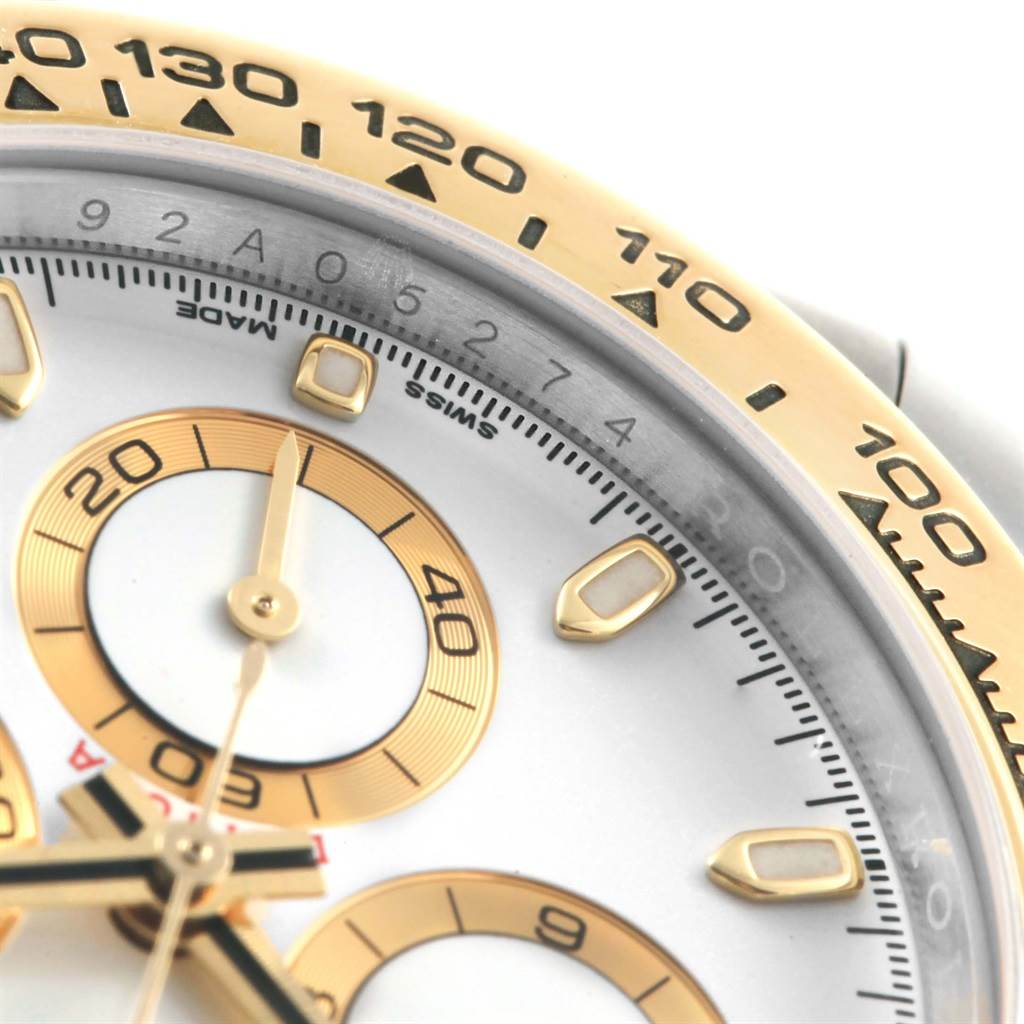The image shows a close-up of the dial and part of the tachymeter bezel of a Rolex Daytona 116503 Men's Steel and Gold (two tone) White Dial 116503 Men's Steel and Gold (two tone) White Dial watch.