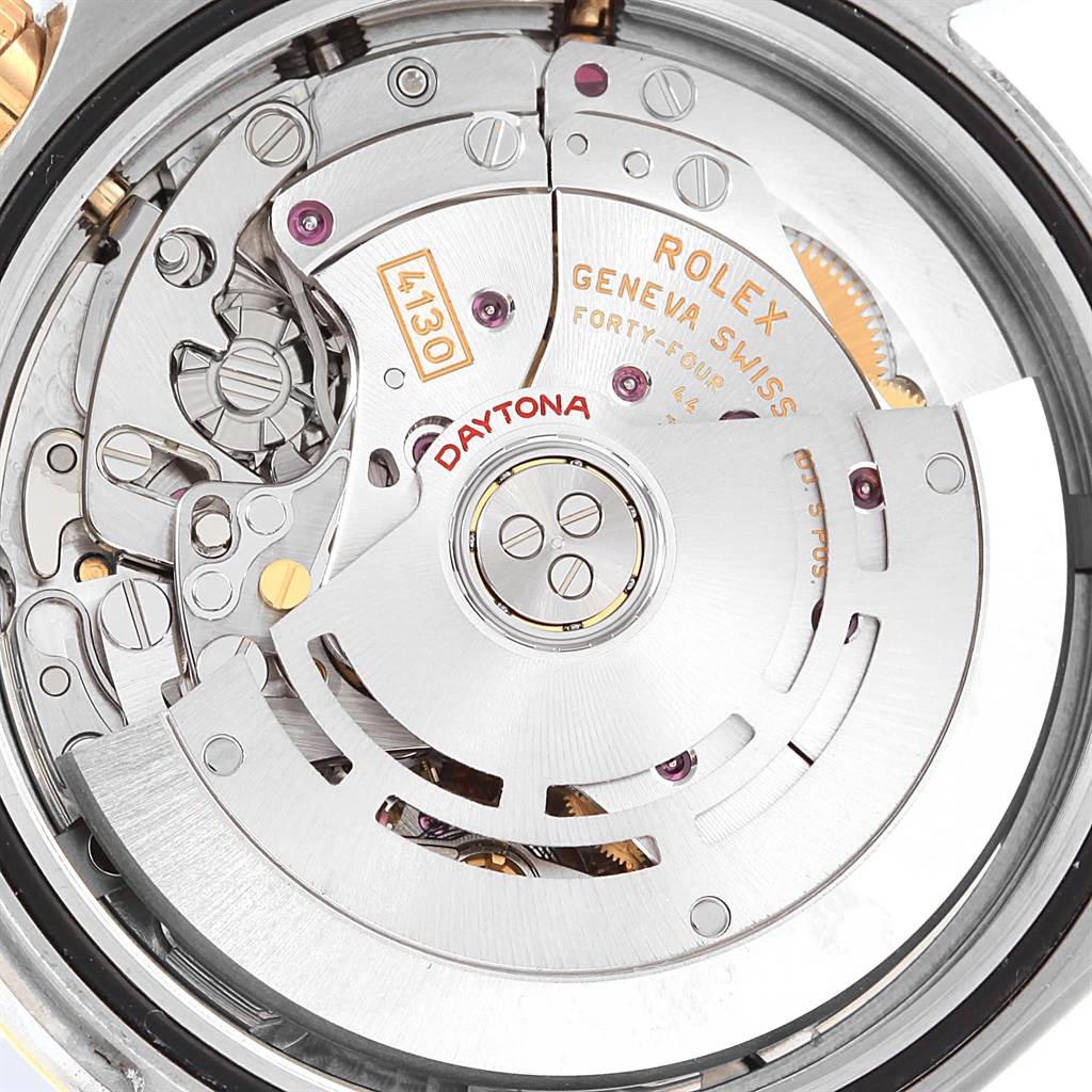 This image shows the intricate movement and mechanics of the Rolex Daytona 116503 Men's Steel and Gold (two tone) White Dial 116503 Men's Steel and Gold (two tone) White Dial model watch from a close-up rear angle.