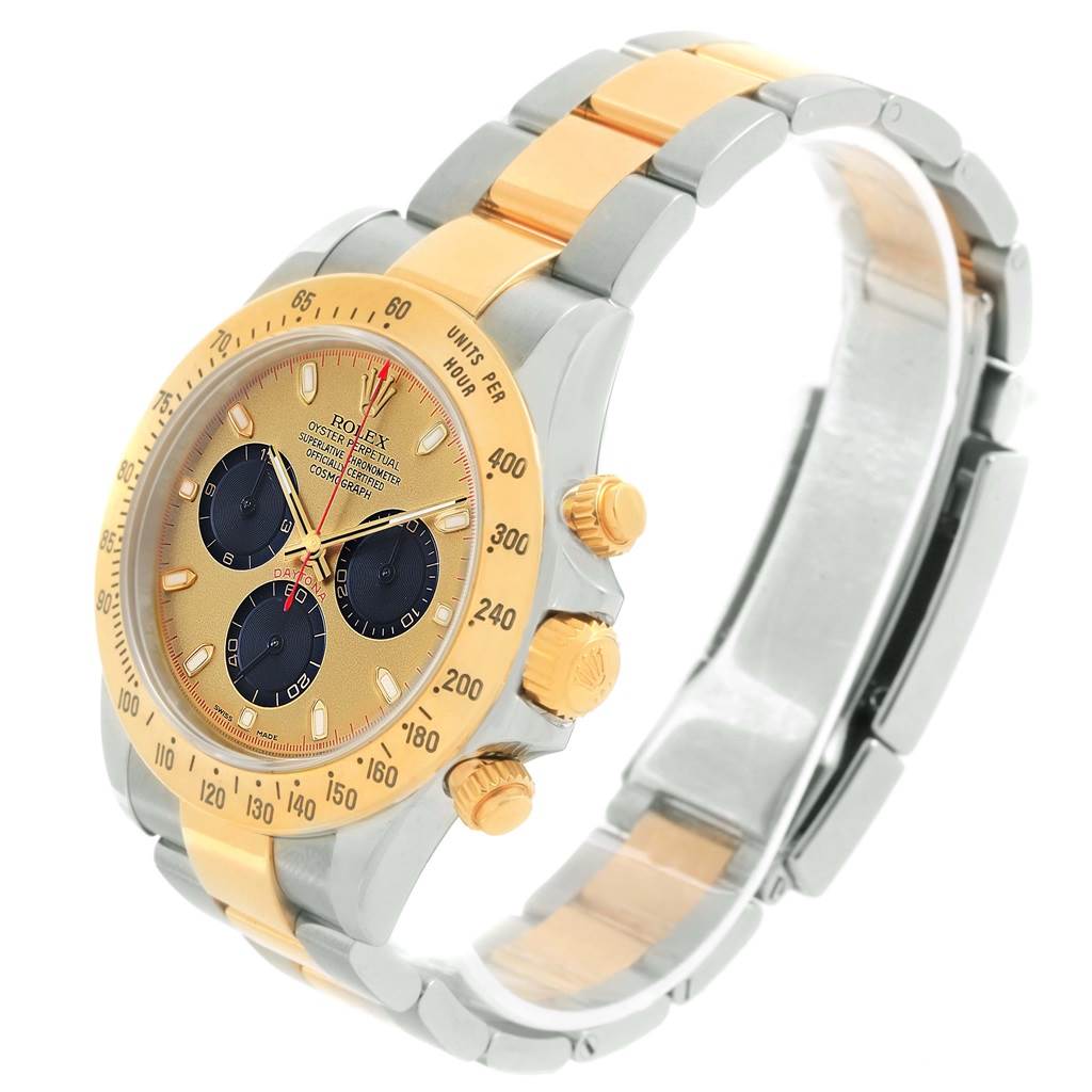 The image shows a Rolex Daytona 116523 Men's Steel and Gold (two tone) Champagne Dial 116523 Men's Steel and Gold (two tone) Champagne Dial watch at a slight angle, highlighting its dial, bezel, pushers, and two-tone bracelet.