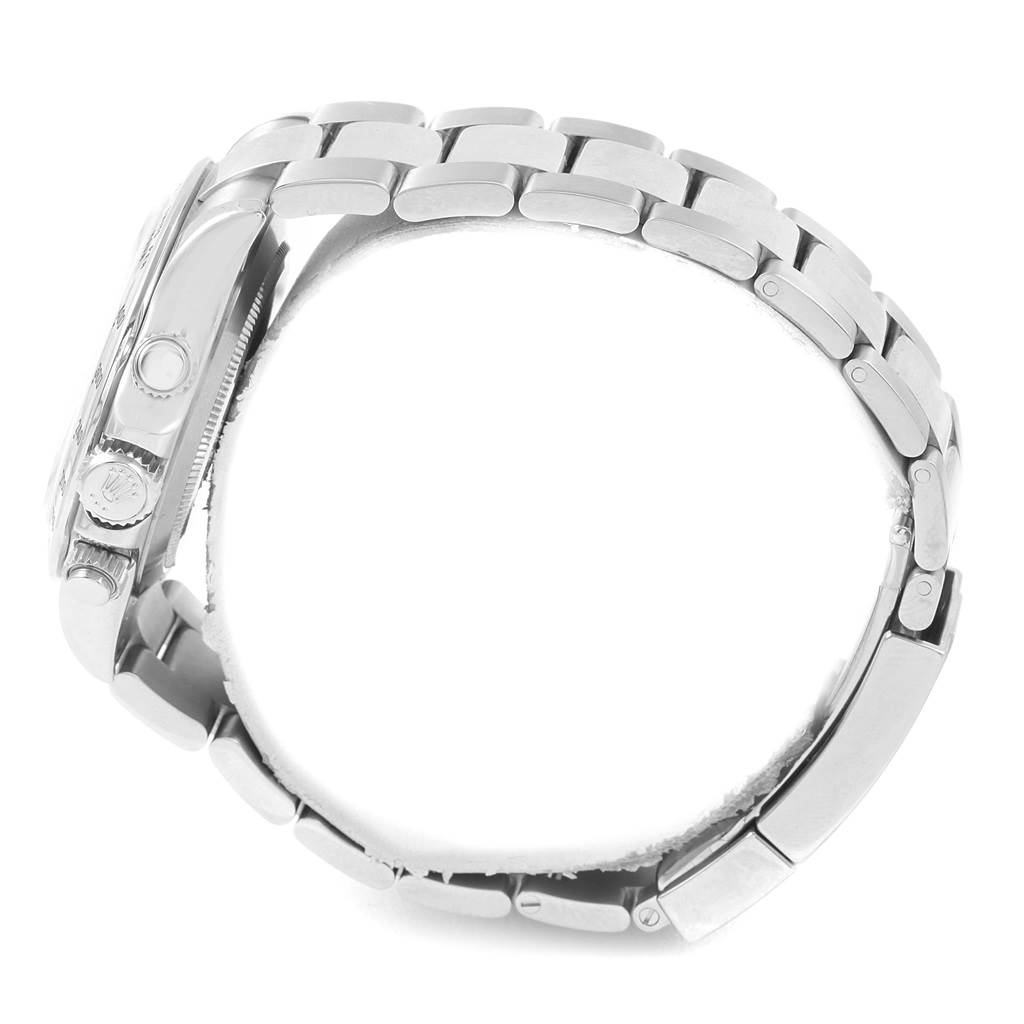 This side-view angle shows the bracelet, crown, and pushers of the Rolex Daytona 116520 Men's Stainless Steel White Dial 116520 Men's Stainless Steel White Dial model watch.