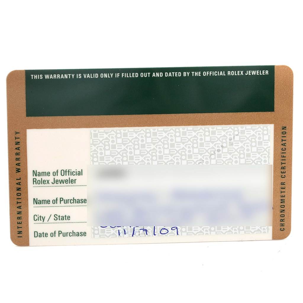 This image shows an International Warranty card for a Rolex Daytona 116520 Men's Stainless Steel White Dial 116520 Men's Stainless Steel White Dial watch, containing spaces for the jeweler, purchaser, location, and date of purchase.