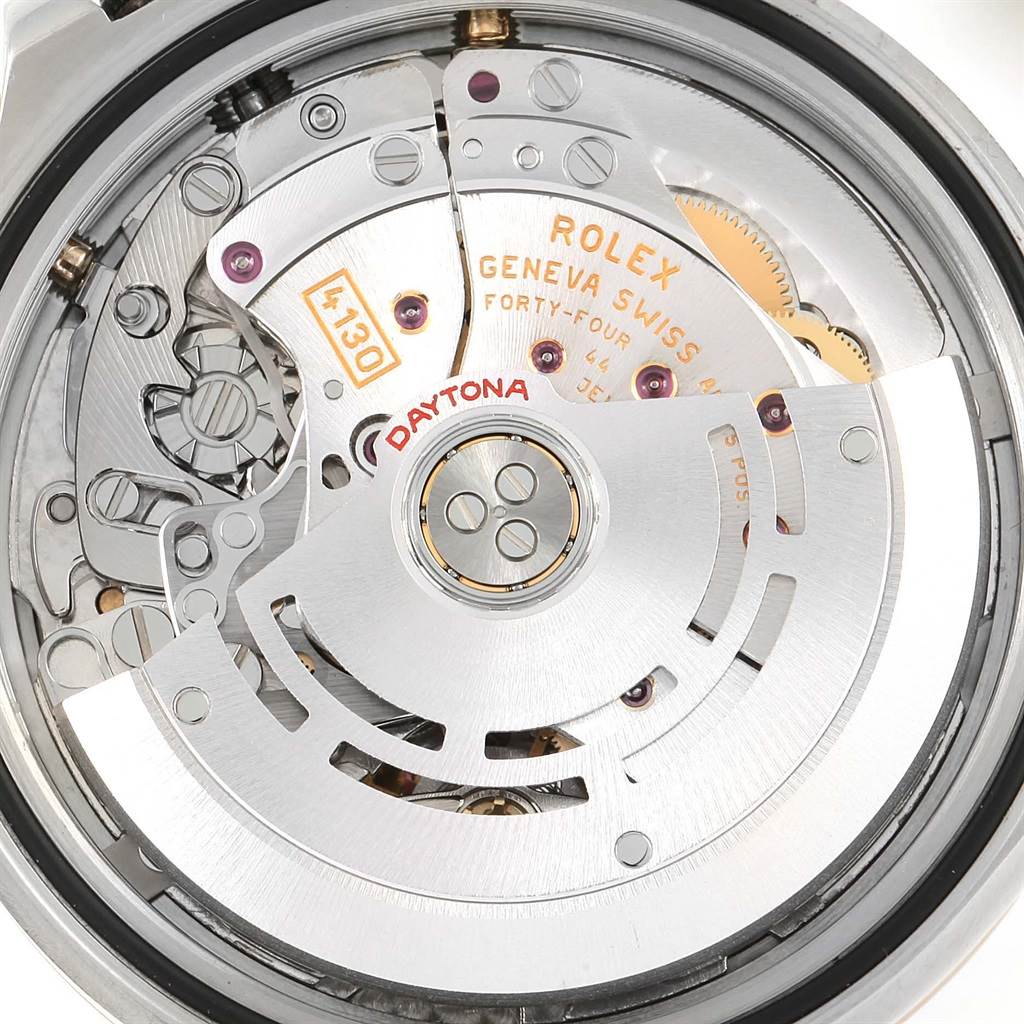 This image shows the movement mechanism of the Rolex Daytona 116523 Men's Steel and Gold (two tone) Black Dial 116523 Men's Steel and Gold (two tone) Black Dial watch from a close-up, backside angle.