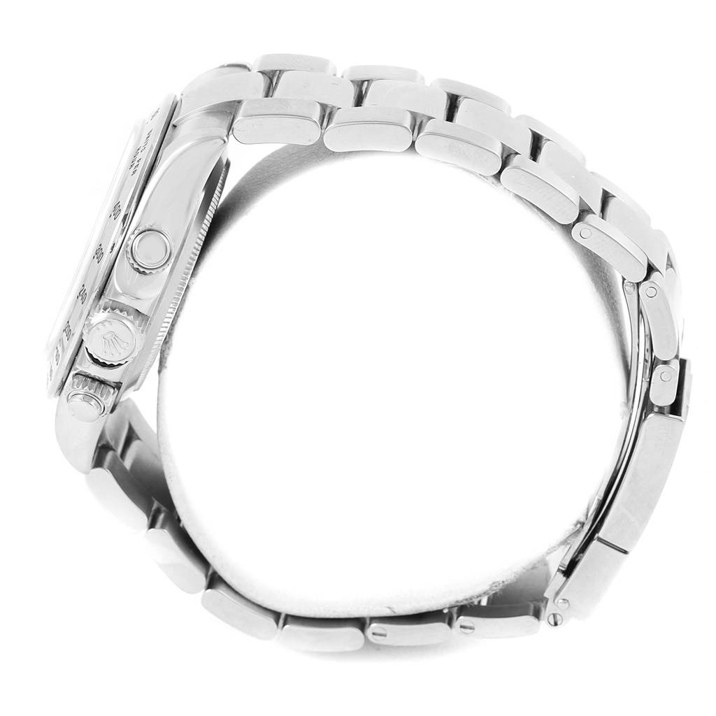 The Rolex Daytona 116520 Men's Stainless Steel Black Dial 116520 Men's Stainless Steel Black Dial watch is shown from the side, focusing on the case, pushers, crown, and part of the bracelet.