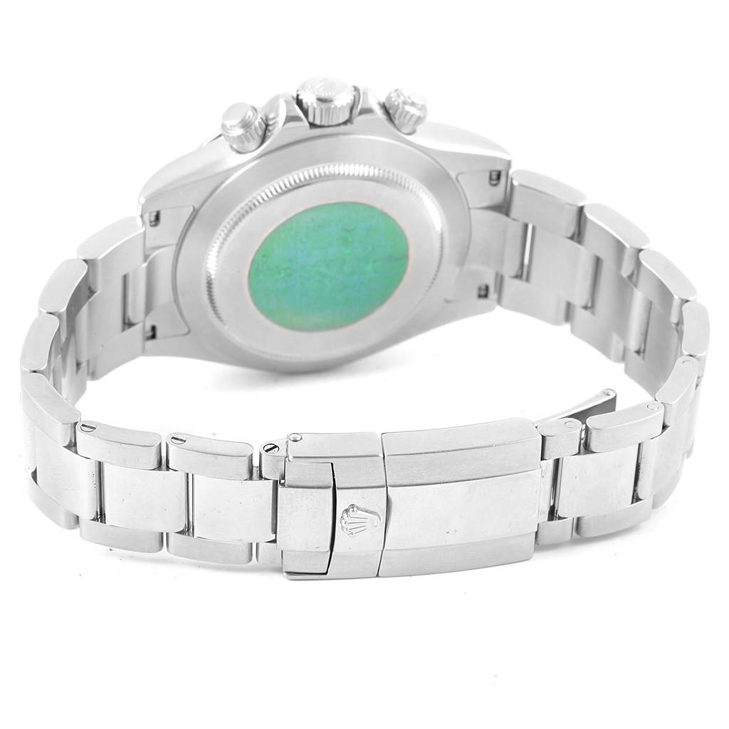 The image shows the backside and clasp of a Rolex Daytona 116520 Men's Stainless Steel Black Dial 116520 Men's Stainless Steel Black Dial watch, including the case back and part of the metal bracelet.