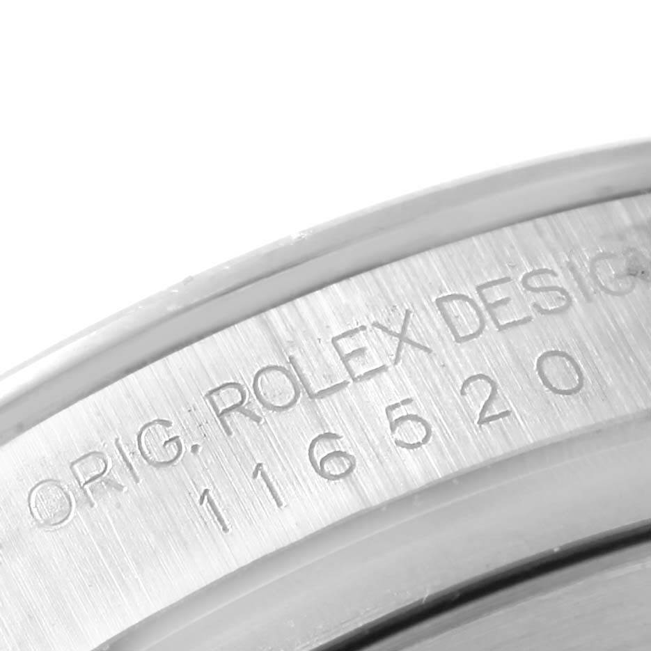 This close-up shows the engraved caseback edge with model number 116520 of a Rolex Daytona 116520 Men's Stainless Steel White Dial 116520 Men's Stainless Steel White Dial watch.