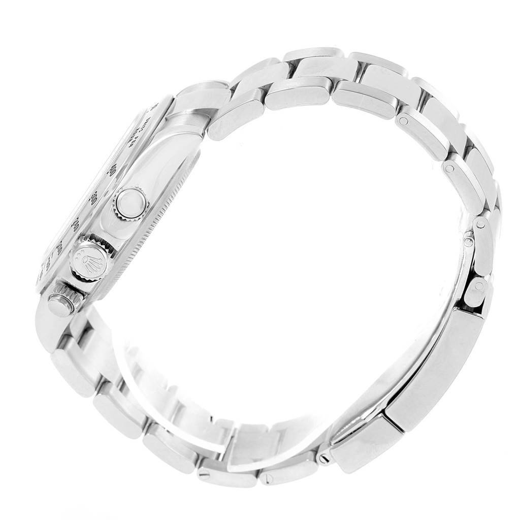 This image shows a side view of the Rolex Daytona 116520 Men's Stainless Steel White Dial 116520 Men's Stainless Steel White Dial watch, highlighting the crown, pushers, and bracelet.