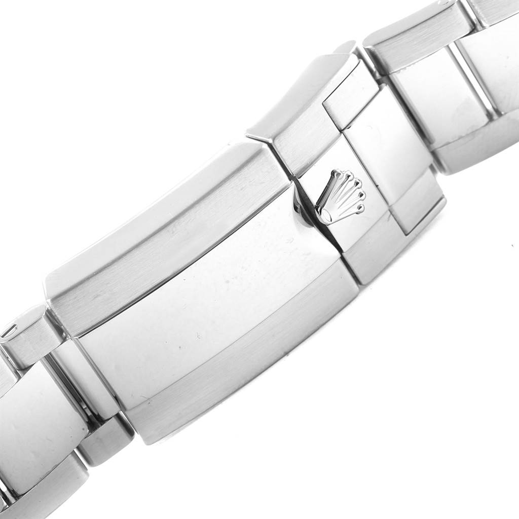 The image shows a close-up of the clasp and bracelet of a Rolex Daytona 116520 Men's Stainless Steel White Dial 116520 Men's Stainless Steel White Dial watch.