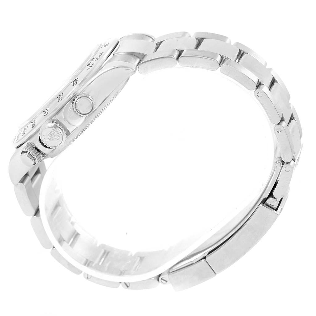 Side view of a Rolex Daytona 116520 Men's Stainless Steel Black Dial 116520 Men's Stainless Steel Black Dial watch showing the bracelet, side buttons, and crown.