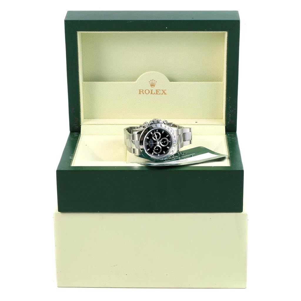 The image shows a Rolex Daytona 116520 Men's Stainless Steel Black Dial 116520 Men's Stainless Steel Black Dial watch with a visible dial and bracelet, placed inside its open branded box.