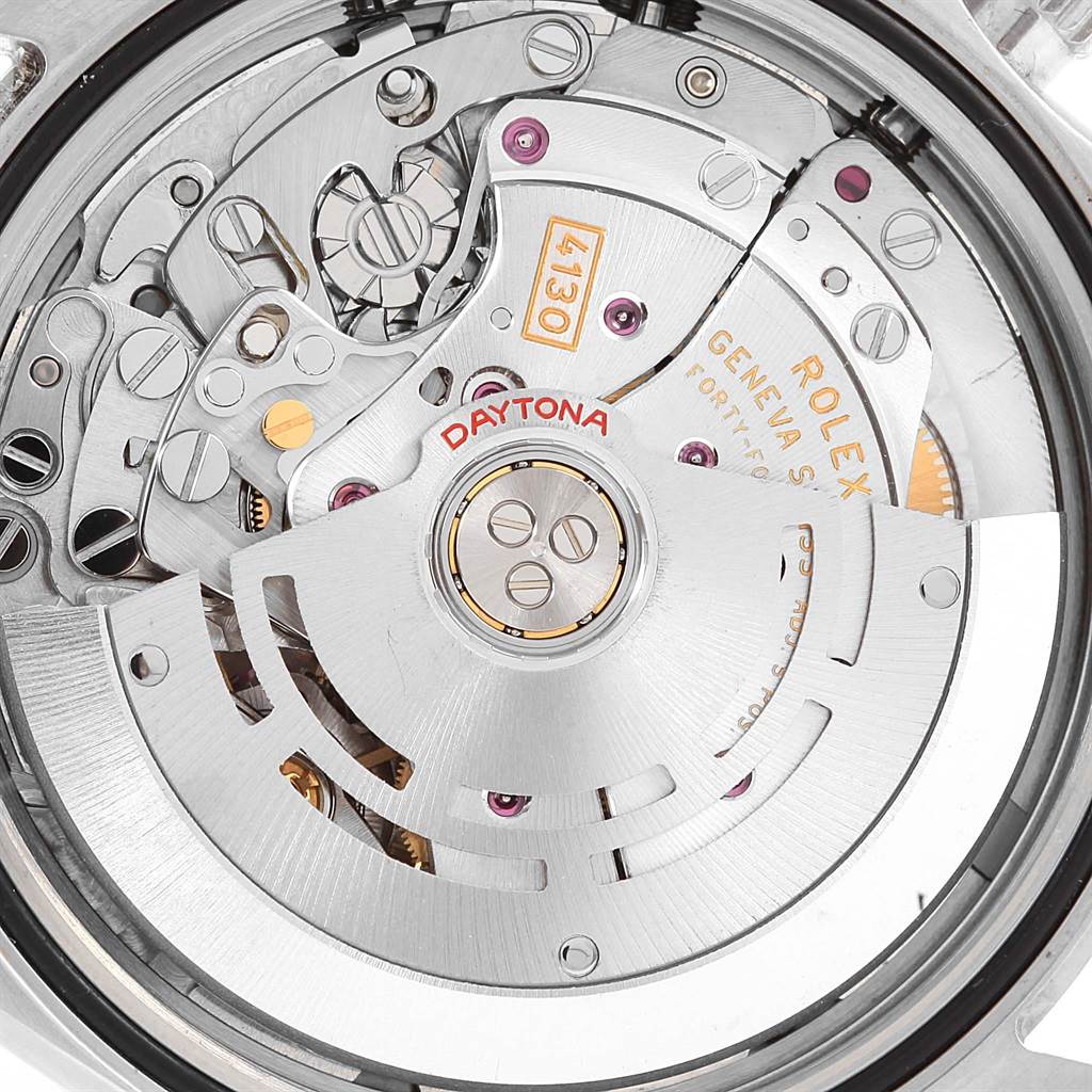 This image shows the intricate internal movement and rotor of a Rolex Daytona 116520 Men's Stainless Steel Black Dial 116520 Men's Stainless Steel Black Dial watch.