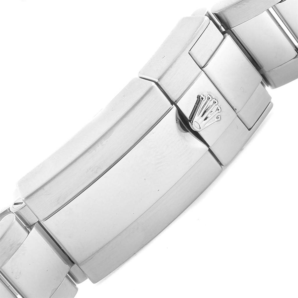 The image shows a close-up view of the clasp and bracelet of a Rolex Daytona 116520 Men's Stainless Steel Black Dial 116520 Men's Stainless Steel Black Dial watch.