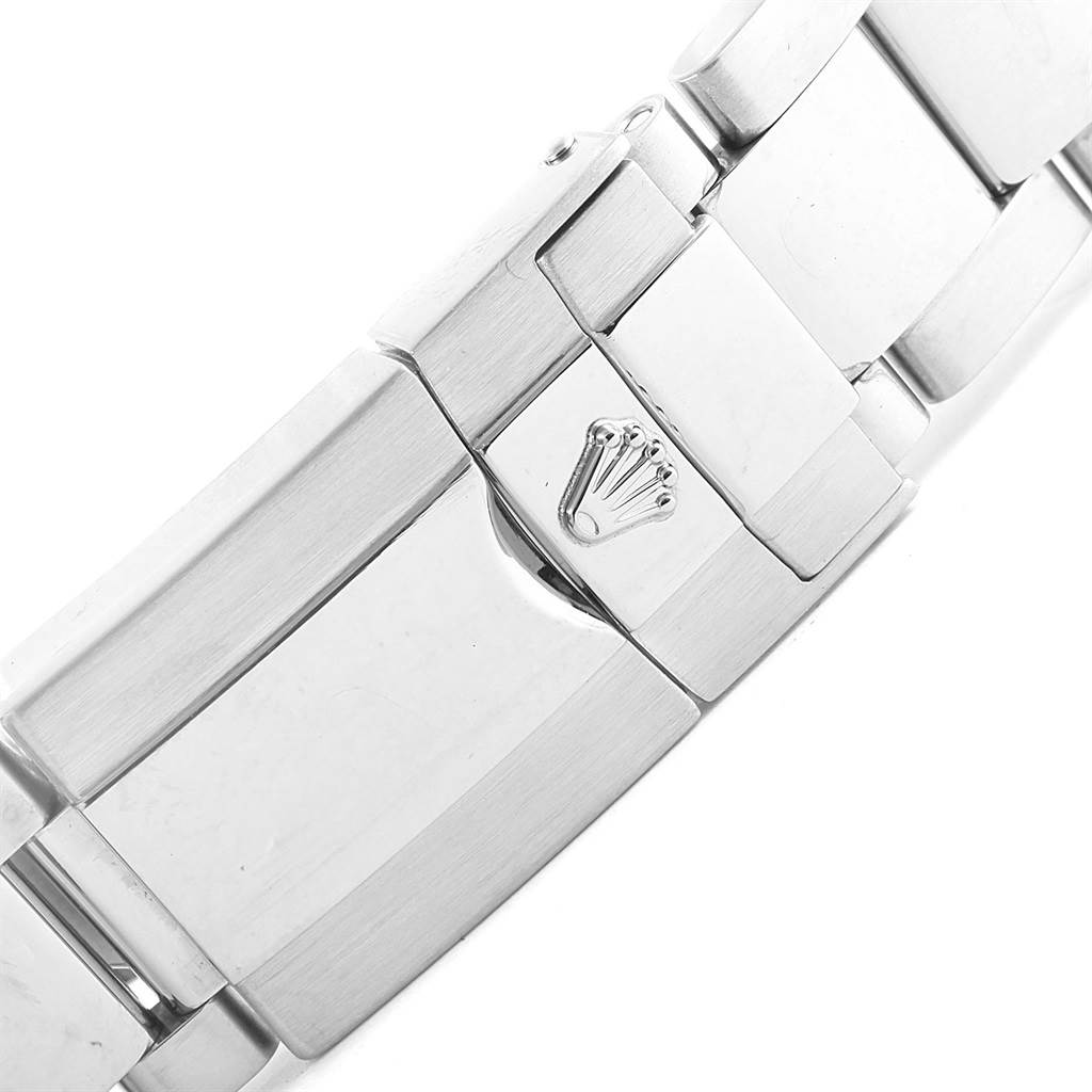 The image shows a close-up view of the clasp of a Rolex Daytona 116520 Men's Stainless Steel White Dial 116520 Men's Stainless Steel White Dial watch, featuring the brand's iconic crown logo.