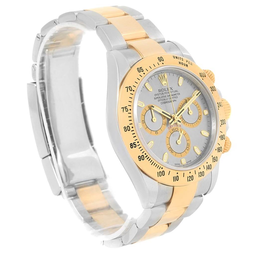 The Rolex Daytona 116523 Men's Steel and Gold (two tone) Grey Dial 116523 Men's Steel and Gold (two tone) Grey Dial watch is shown at an angle highlighting the face, bezel, and bracelet.
