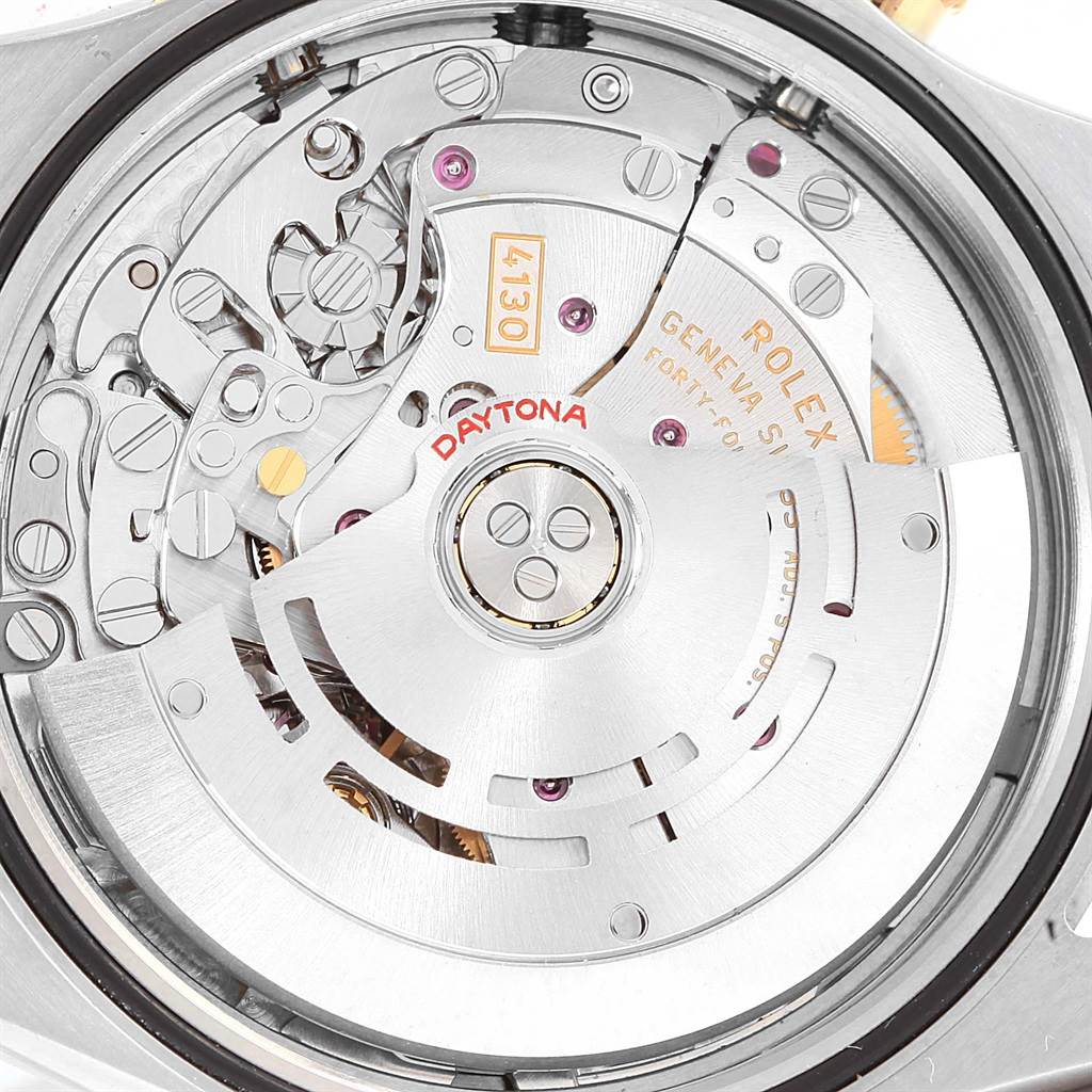 The image shows a close-up of the internal movement of the Rolex Daytona 116523 Men's Steel and Gold (two tone) Grey Dial 116523 Men's Steel and Gold (two tone) Grey Dial watch, model 4130.