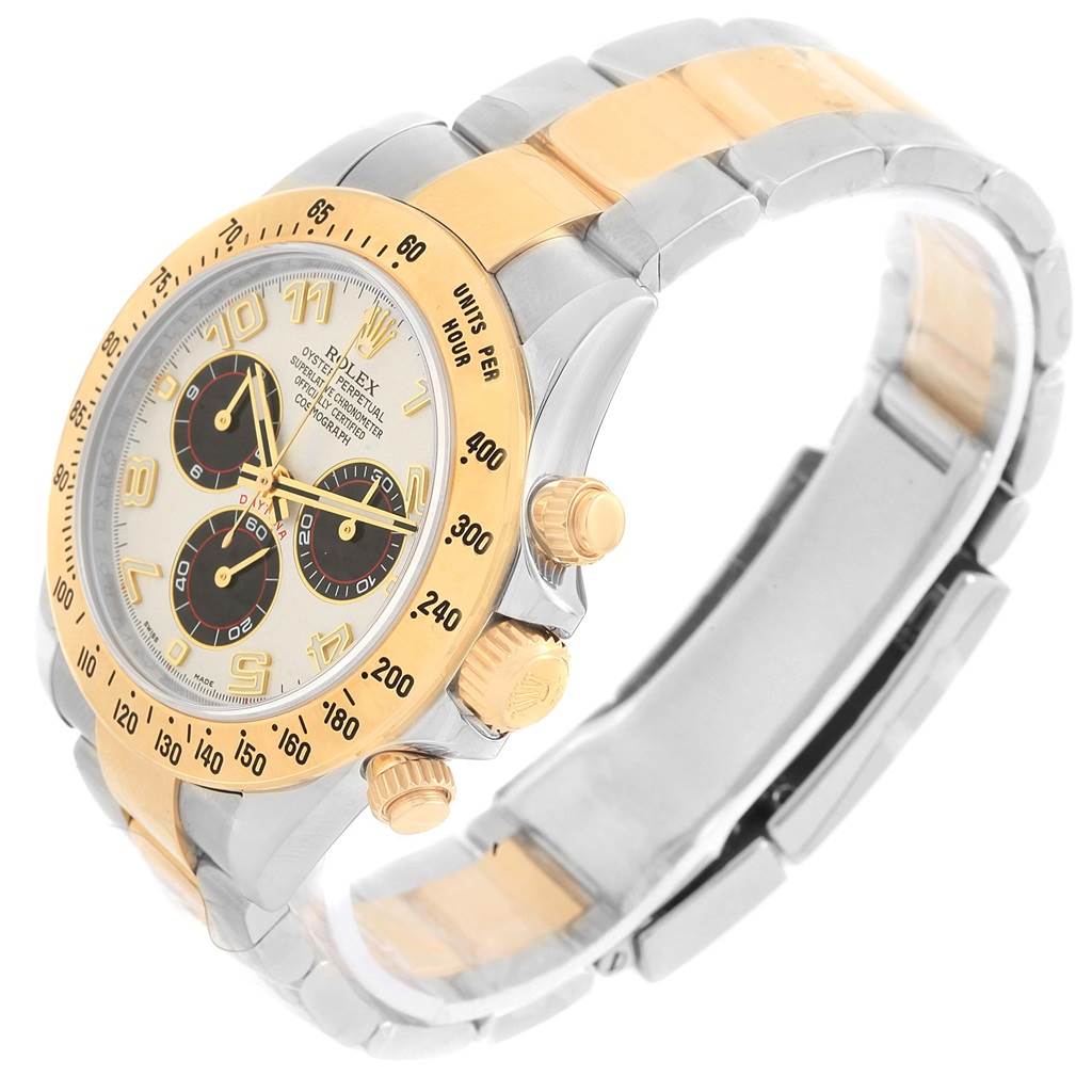This image shows a side angle of a Rolex Daytona 116523 Men's Steel and Gold (two tone) White Dial 116523 Men's Steel and Gold (two tone) White Dial watch, highlighting its dial, bezel, crown, pushers, and bracelet.