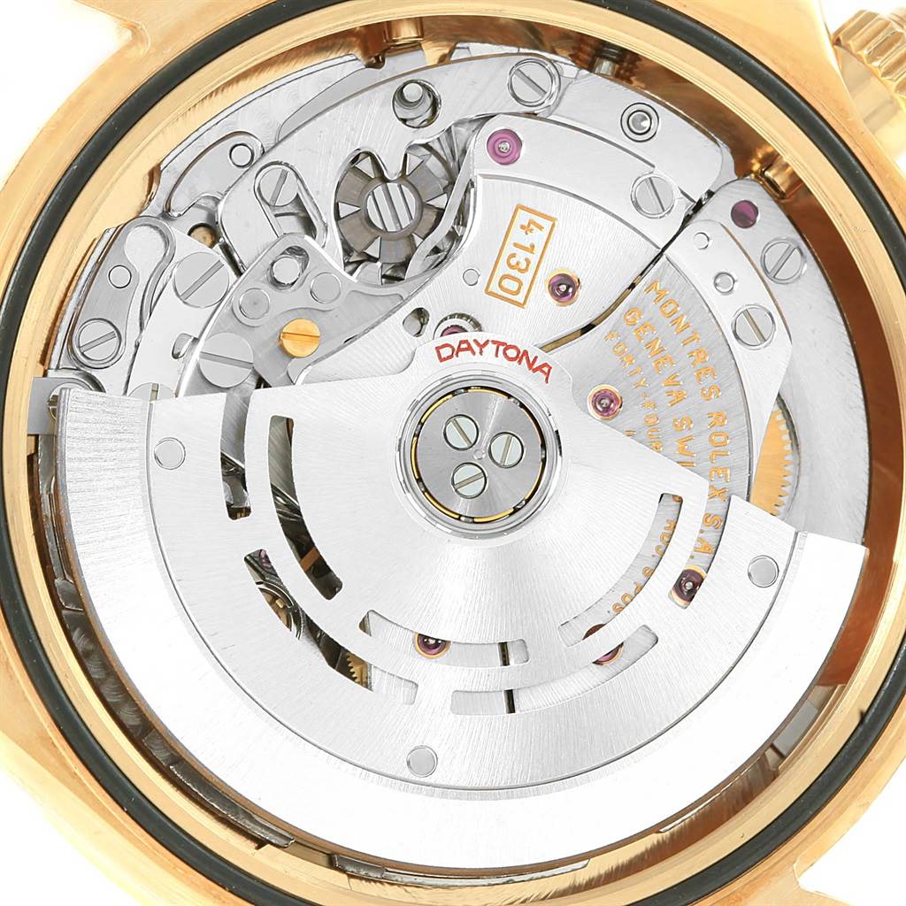 This image shows a close-up view of the mechanical movement inside a Rolex Daytona 116528 Men's Yellow Gold Champagne Dial 116528 Men's Yellow Gold Champagne Dial watch.