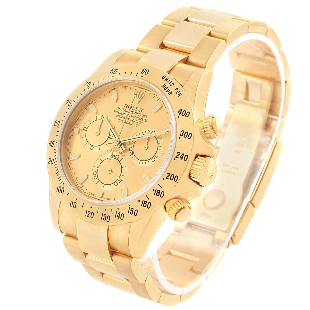 The image shows a gold Rolex Daytona 116528 Men's Yellow Gold Champagne Dial 116528 Men's Yellow Gold Champagne Dial watch angled slightly from the front right, highlighting its dial, bezel, and bracelet.
